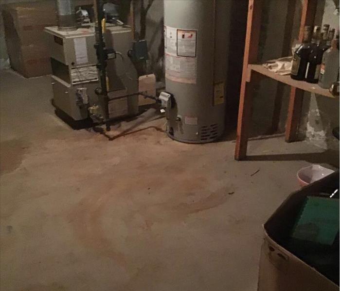 After shot of hot water heater leak